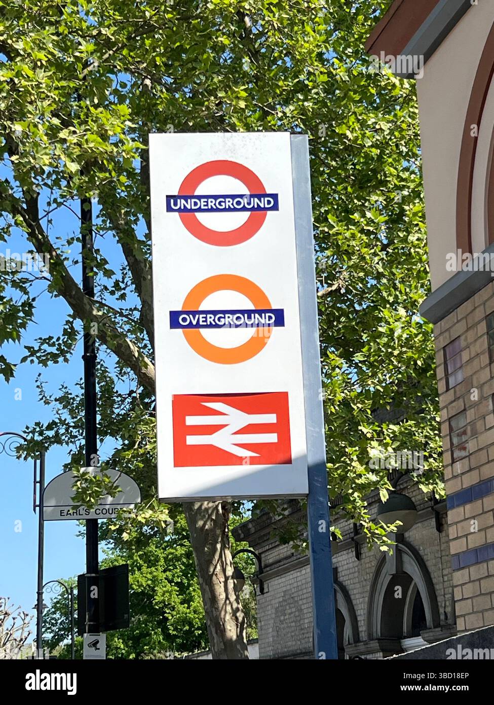 Underground, Overground, 'Wombling Free', British rail sign at West Brompton station , Fulham, West London - Smartphone Captured Stock Image