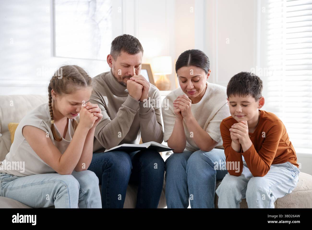 Children praying together school hi-res stock photography and images ...