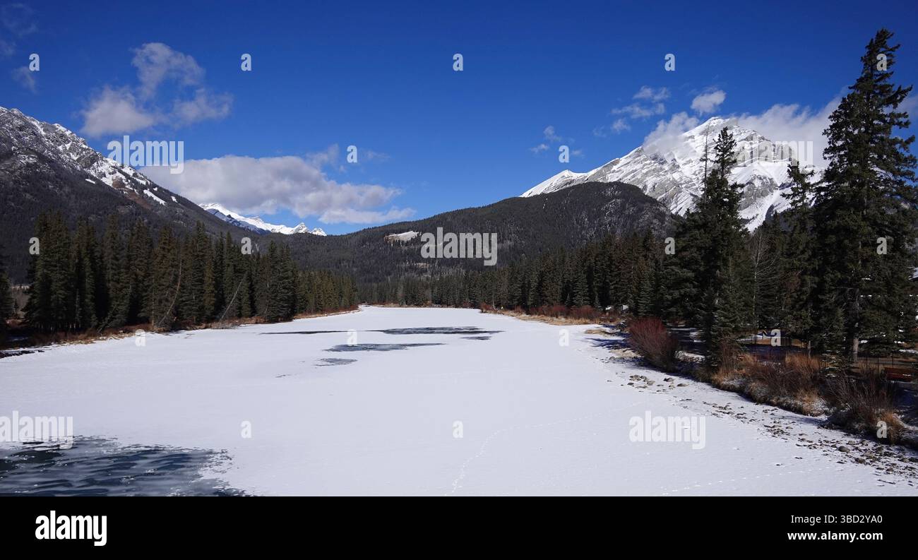 Frozen Bow River in Banff Canada Stock Photo