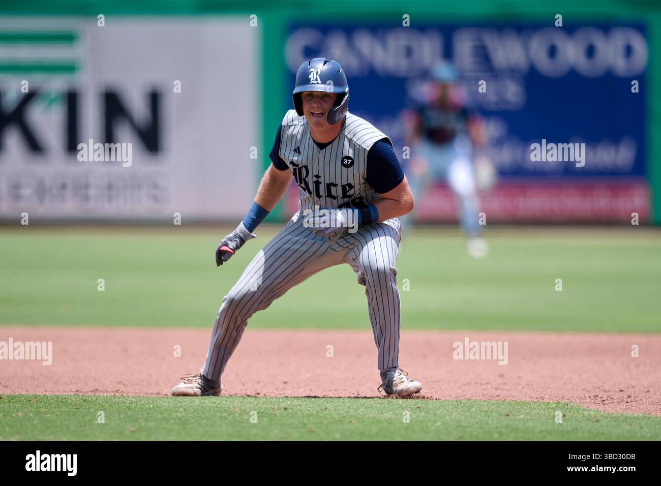 Rice Owls Landon West (28) leads off first base during an American ...