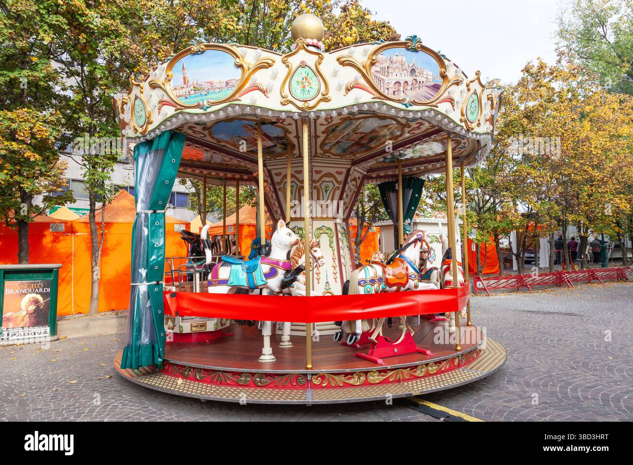 Colourful animal rides on a small Italian Bertazzon carousel at an ...