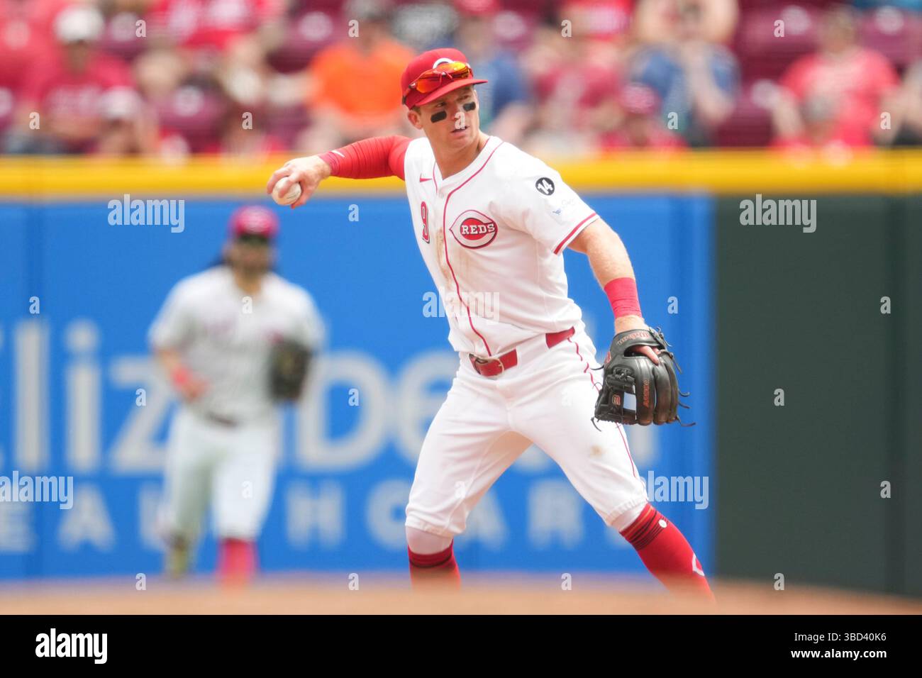 Cincinnati Reds second baseman Matt McLain (9) looks to throw during a ...