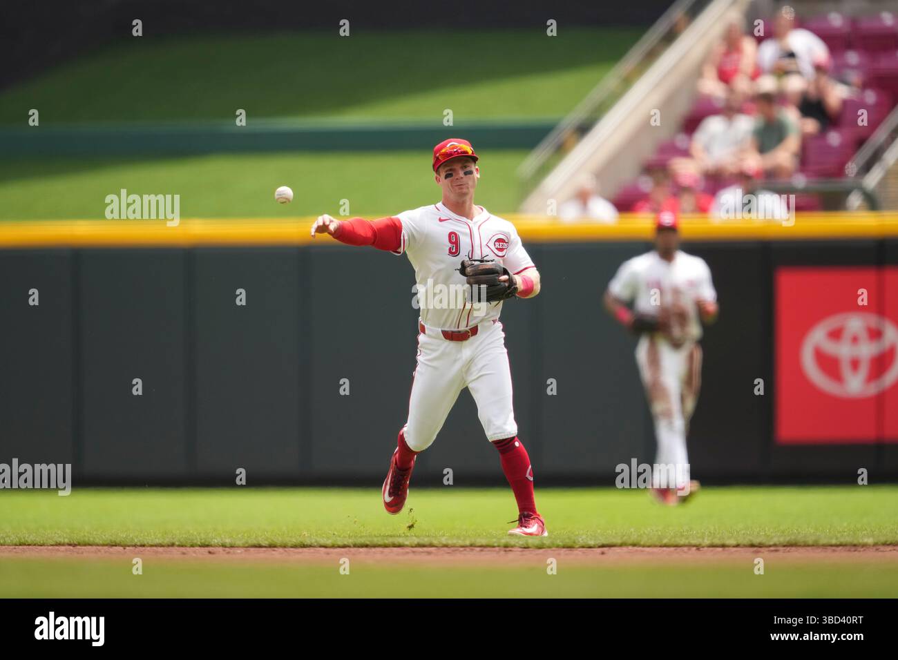 Cincinnati Reds second baseman Matt McLain (9) throws during a baseball ...