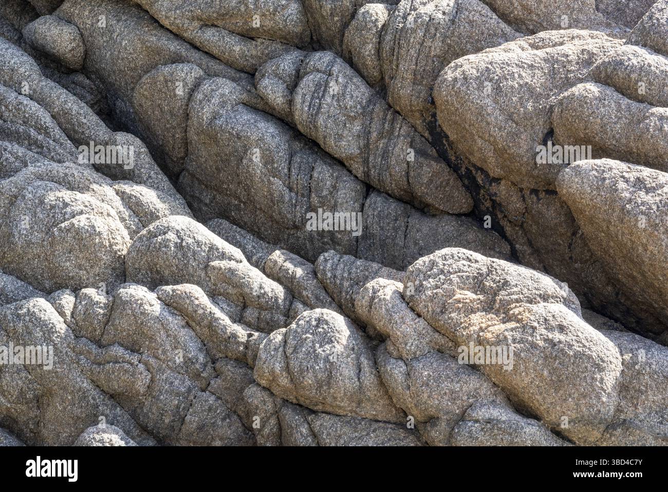 Round polished granite rocks as texture or background Stock Photo