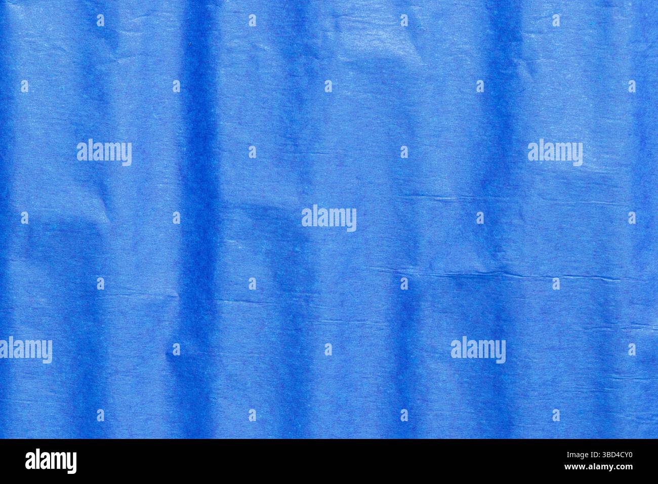 Blue crepe tissue craft paper background backdrop. Craft hobby material concept. Stock Photo
