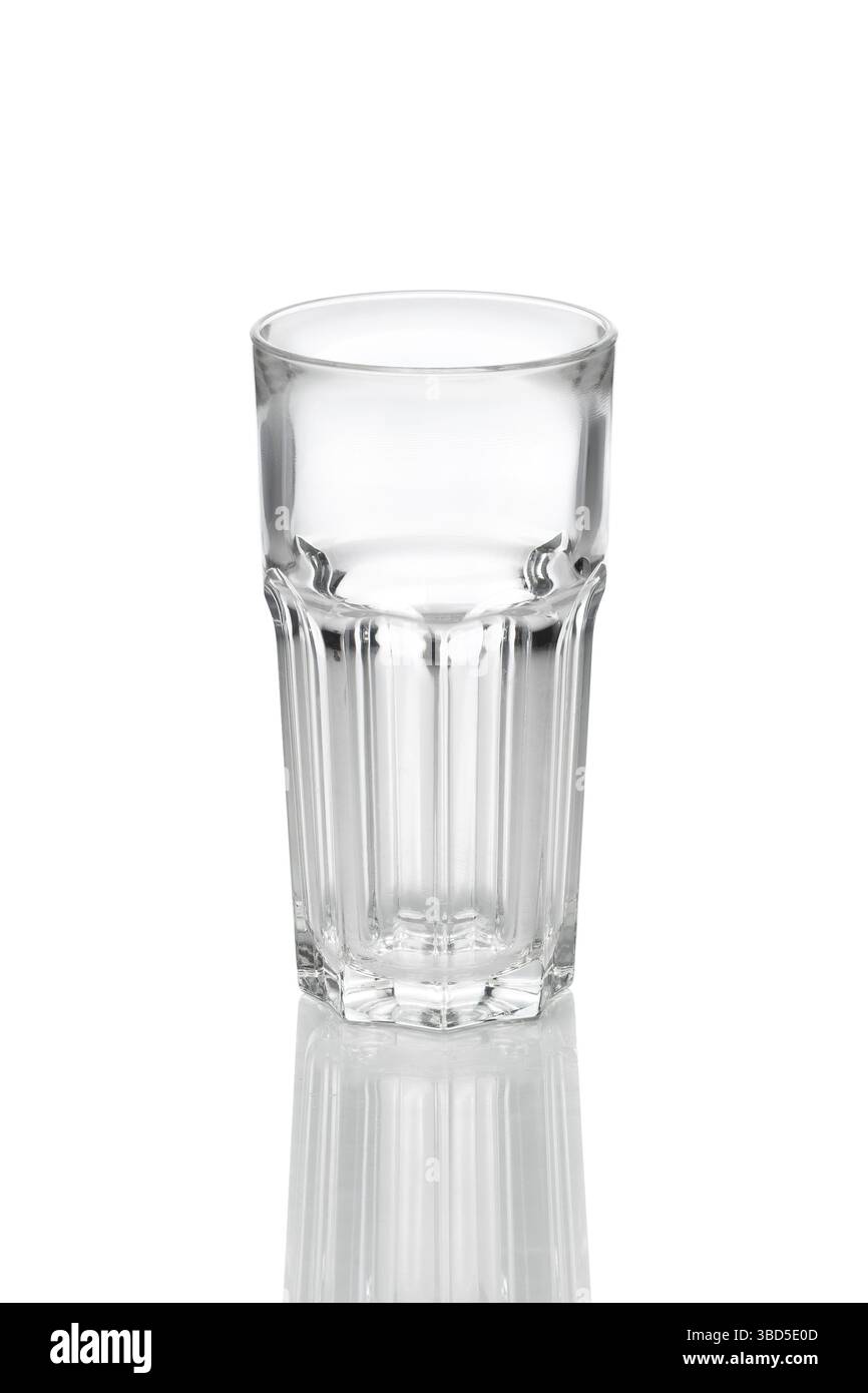Empty transparent faceted glass with reflection on white background Stock Photo