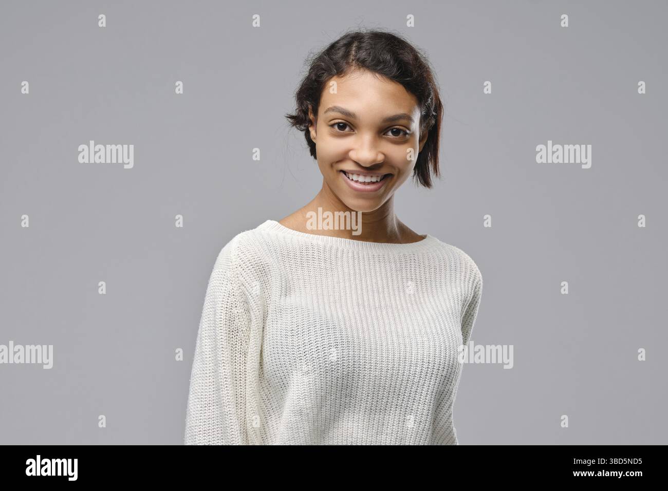 Closeup portrait of smiling young african woman Stock Photo