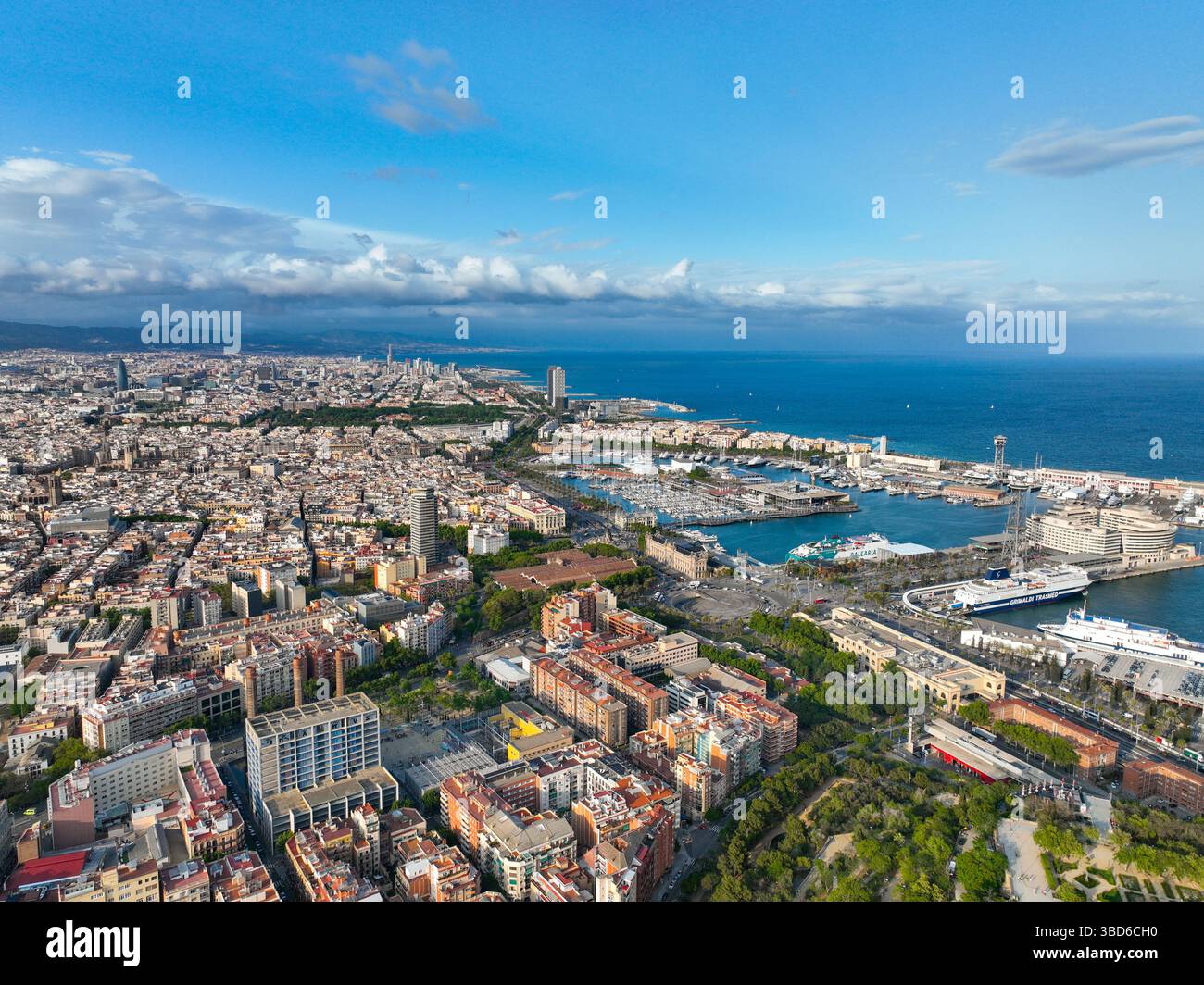 Aerial of Barcelona's coast, city towers, marina and horizon Stock ...