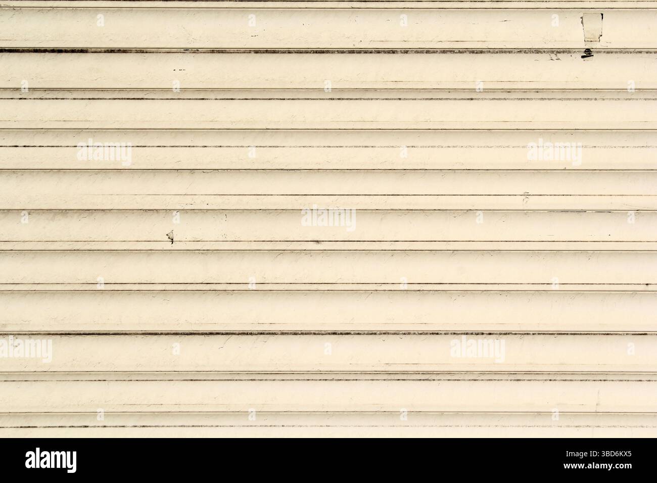 Close-up of a cream-coloured timber wall abstract texture background Stock Photo