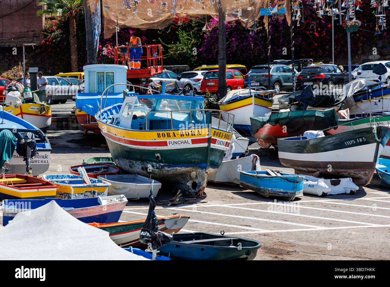 Camara de Lobos, Portugal - June 11, 2024: Fishing boats in port of Camara de Lobos on Madeira Island, Portugal Stock Photo