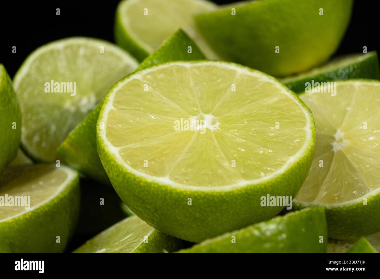Sliced Open Limes in Close Focus. Stock Photo