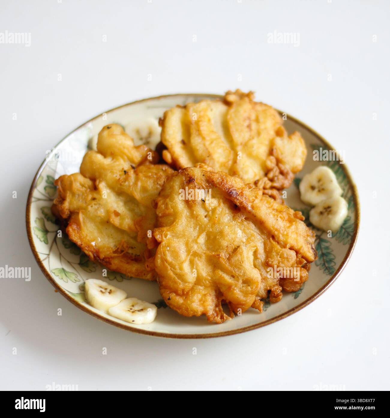 Banana fritters chocolate sauce hi-res stock photography and images - Alamy, image size:1300x1390
