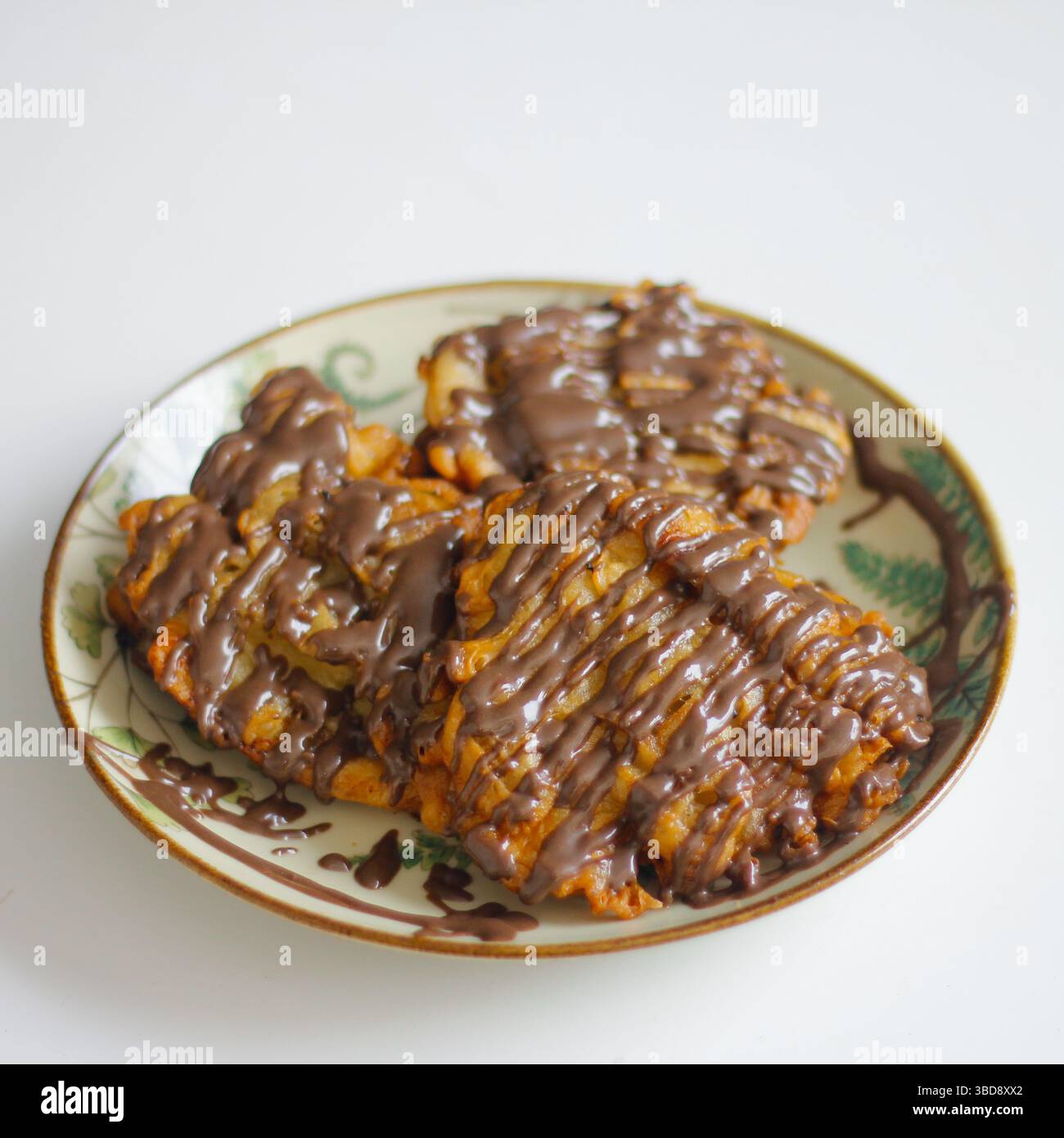 Banana fritters hi-res stock photography and images - Alamy, image size:1300x1390