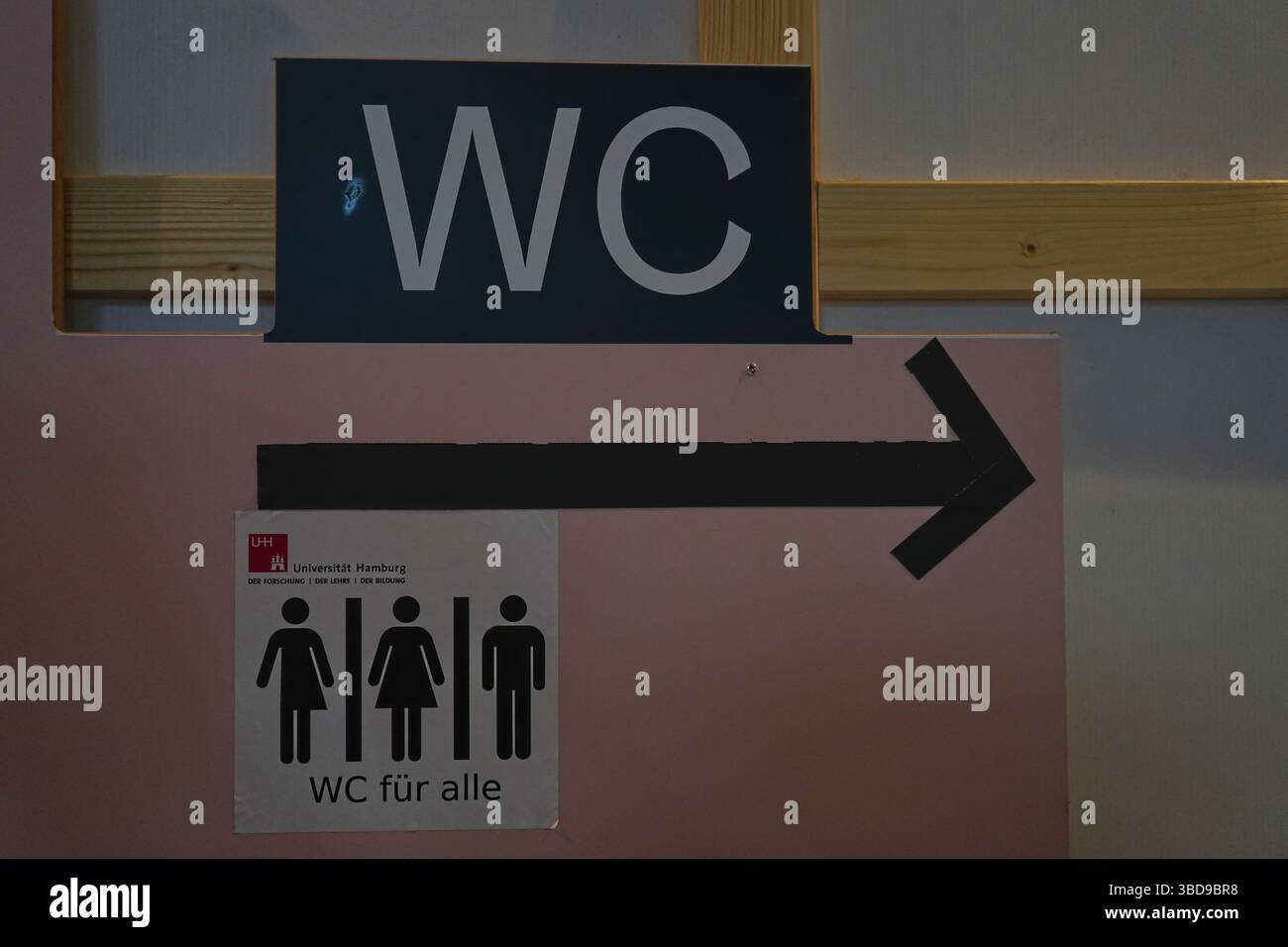 An all inclusive WC sign 'WC for all', depicted in the pictorials that it is a gender neutral WC/toilet, courtesy of Uni Hamburg, at an Art Center Stock Photo