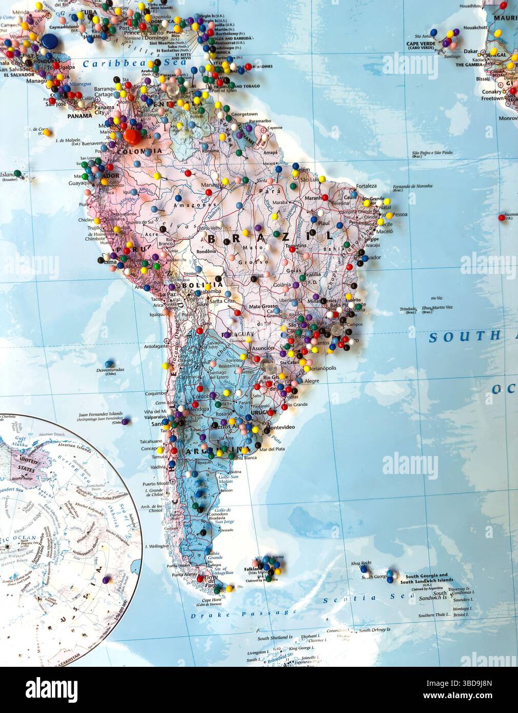 world map isolated on south america australia with multi coloured pins - Smartphone Captured Stock Image