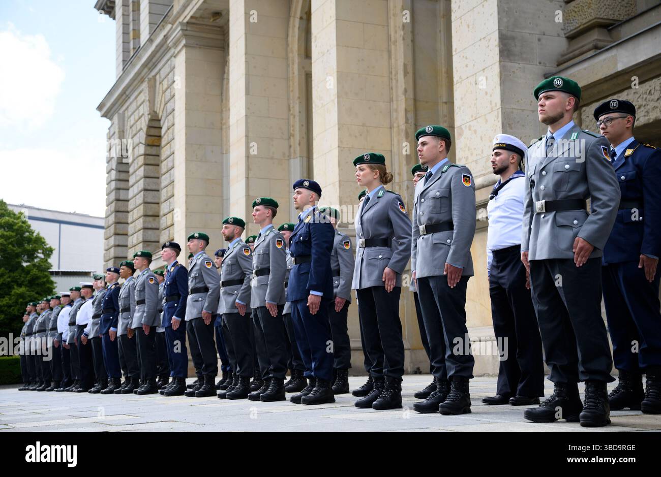 Berlin, Germany. 23rd May, 2025. Recruits stand in front of the Berlin ...