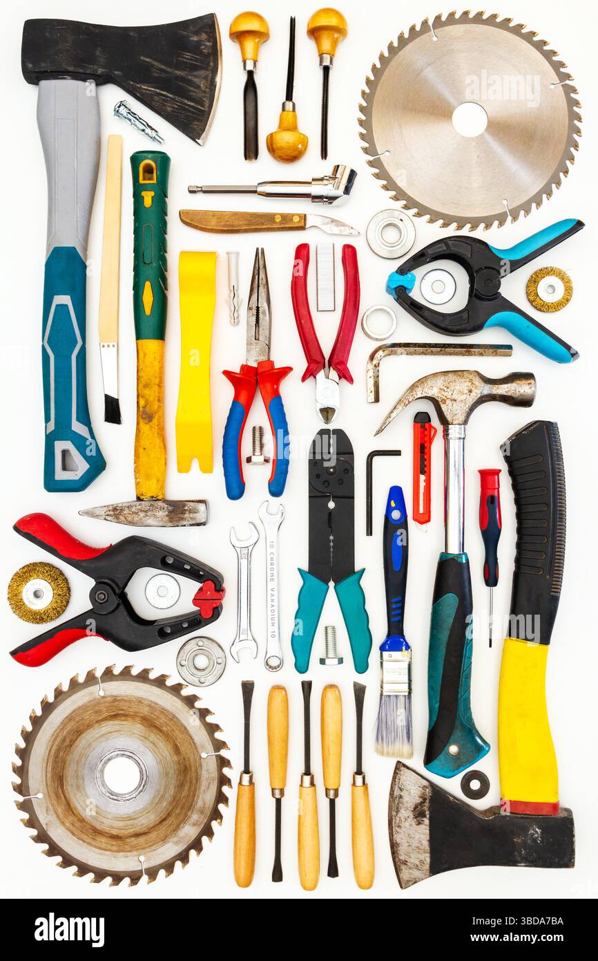 Flat lay of new and used hand tools on white background. Large ...