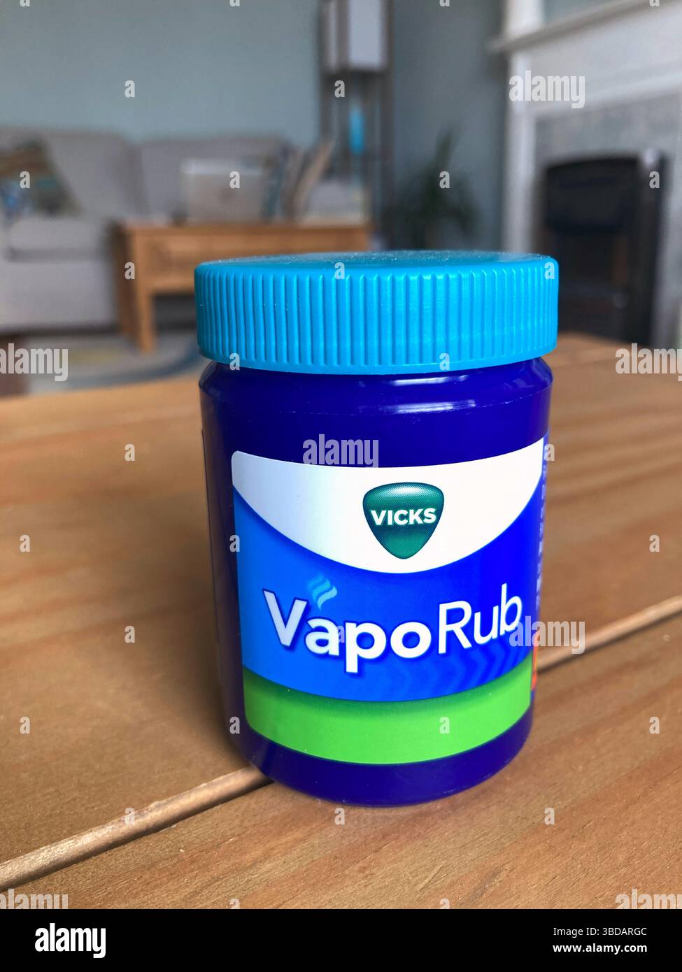 A bottle of Vicks VapoRub ointment for the relief of Nasal catarrh, Sore throat, Congestion, Coughs and colds - Smartphone Captured Stock Image