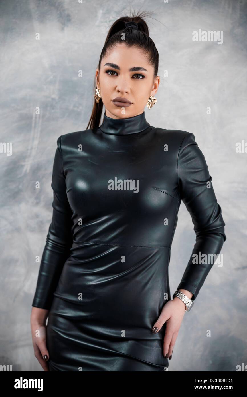 Black skin tight dress hi-res stock photography and images - Alamy