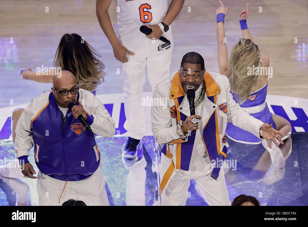 Rapper Busta Rhymes, right, performs during half time of Game 2 of the ...