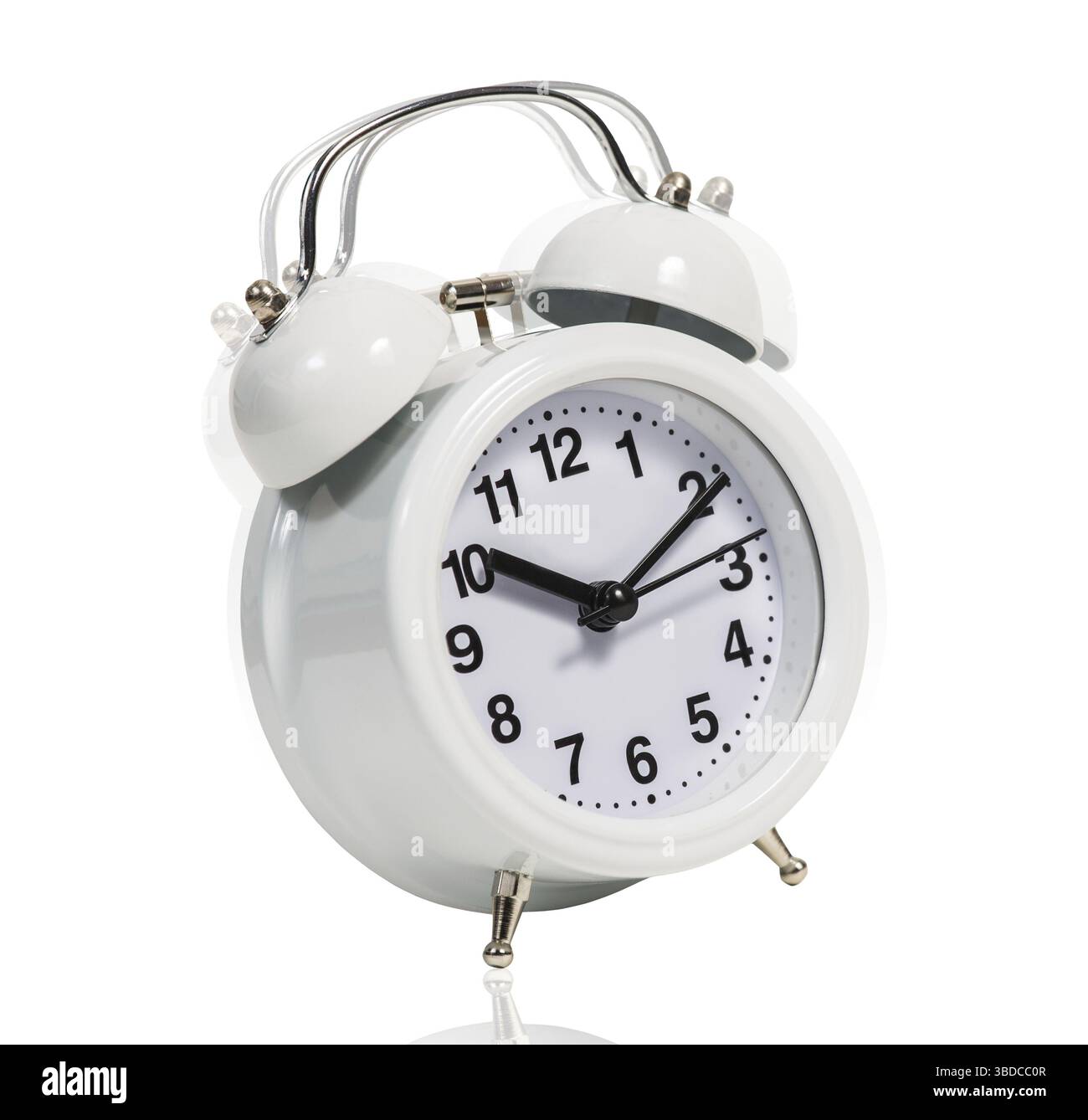 Classical alarm clock ringing on the white background Stock Photo
