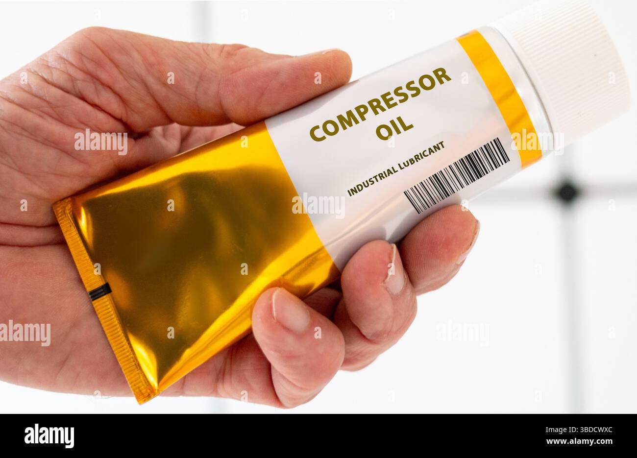 Compressor oil. Oil designed to lubricate air compressors, preventing wear and overheating. Stock Photo