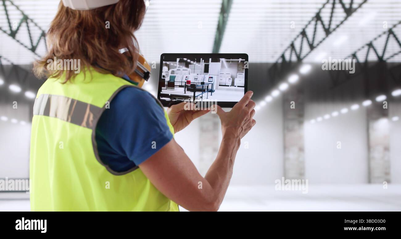 Future Industrial Engineer At A Semiconductor Plant Using Augmented Reality. Stock Photo