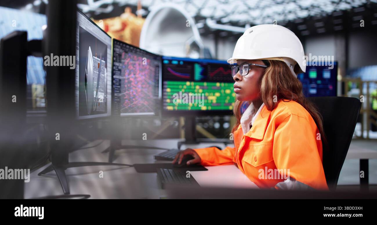 Female Engineer Developing Satellite Model Using 3D CAD Design Software Stock Photo