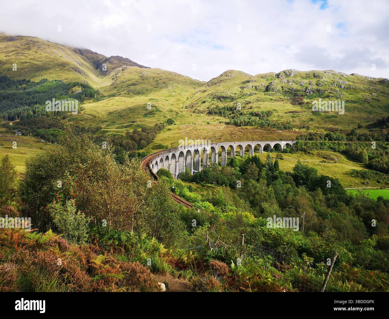 Glenfinnan Viaduct in Scotland made famous by scenes from Harry Potter films and the Hogwart's Express. - Smartphone Captured Stock Image