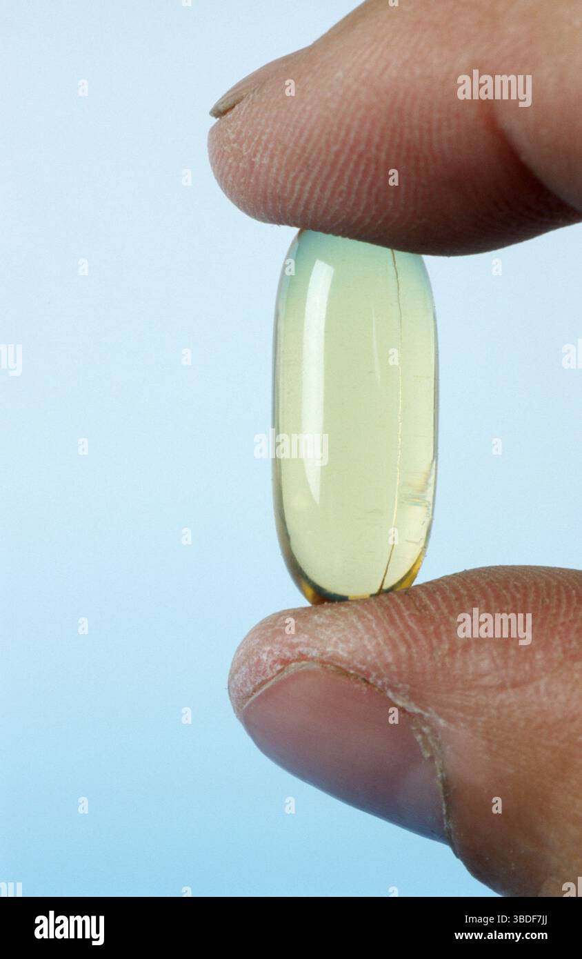 Salmon oil tablet, salmon oil tablet, salmon oil capsules, dietary supplement, indoor, studio Stock Photo