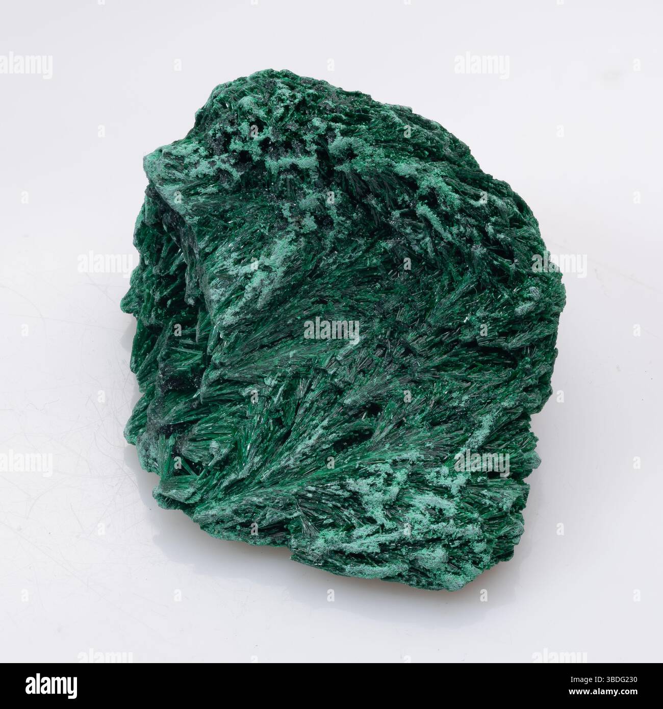 A striking, unpolished malachite rock specimen with a vibrant, deep ...
