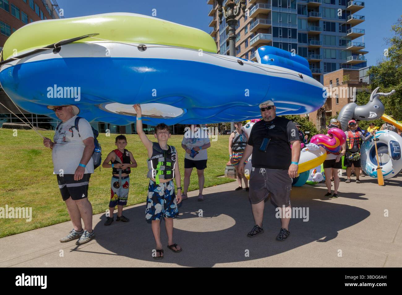 The Big Float, Portland, Oregon - July 14th 2018: People carry a large ...