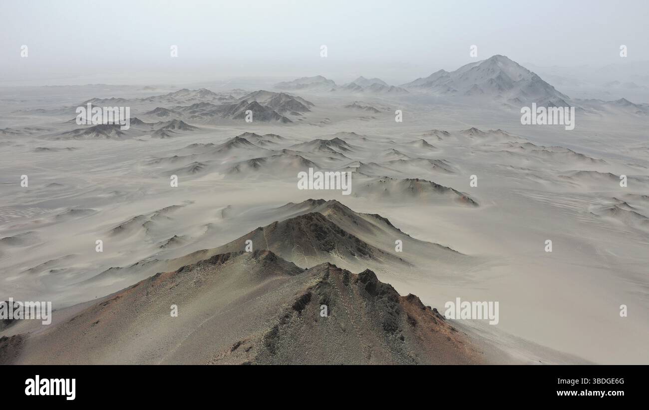 An aerial view shows the unique black Yardang landform of Heidushan ...