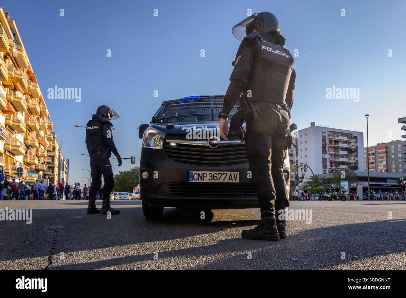 Riot police stand guard near the Sanchez-Pizjuan Stadium in Seville ...