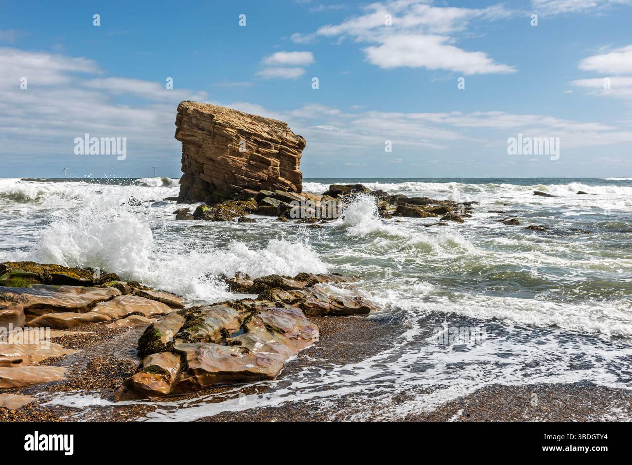 Crashing Waves: Sea Stack at Collywell Bay Stock Photo