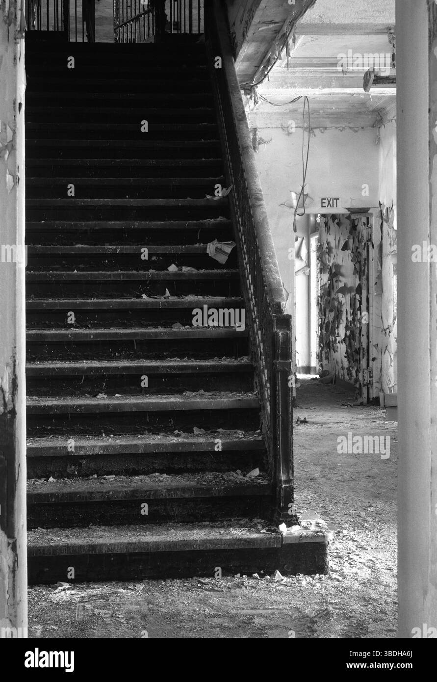 Staircase in abandoned prison Stock Photo