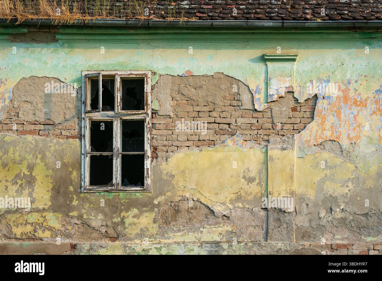 Cracks of Time. Broken Window Frame. Stock Photo