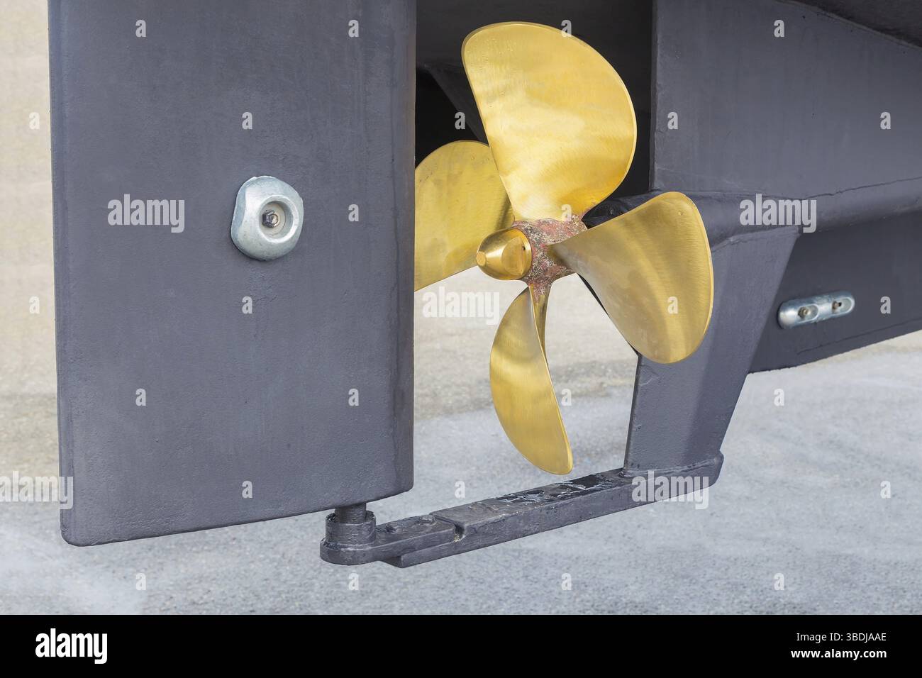 Retro Gold Rudder Gold-colored metal propeller and grey rudder of ship Stock Photo - Alamy