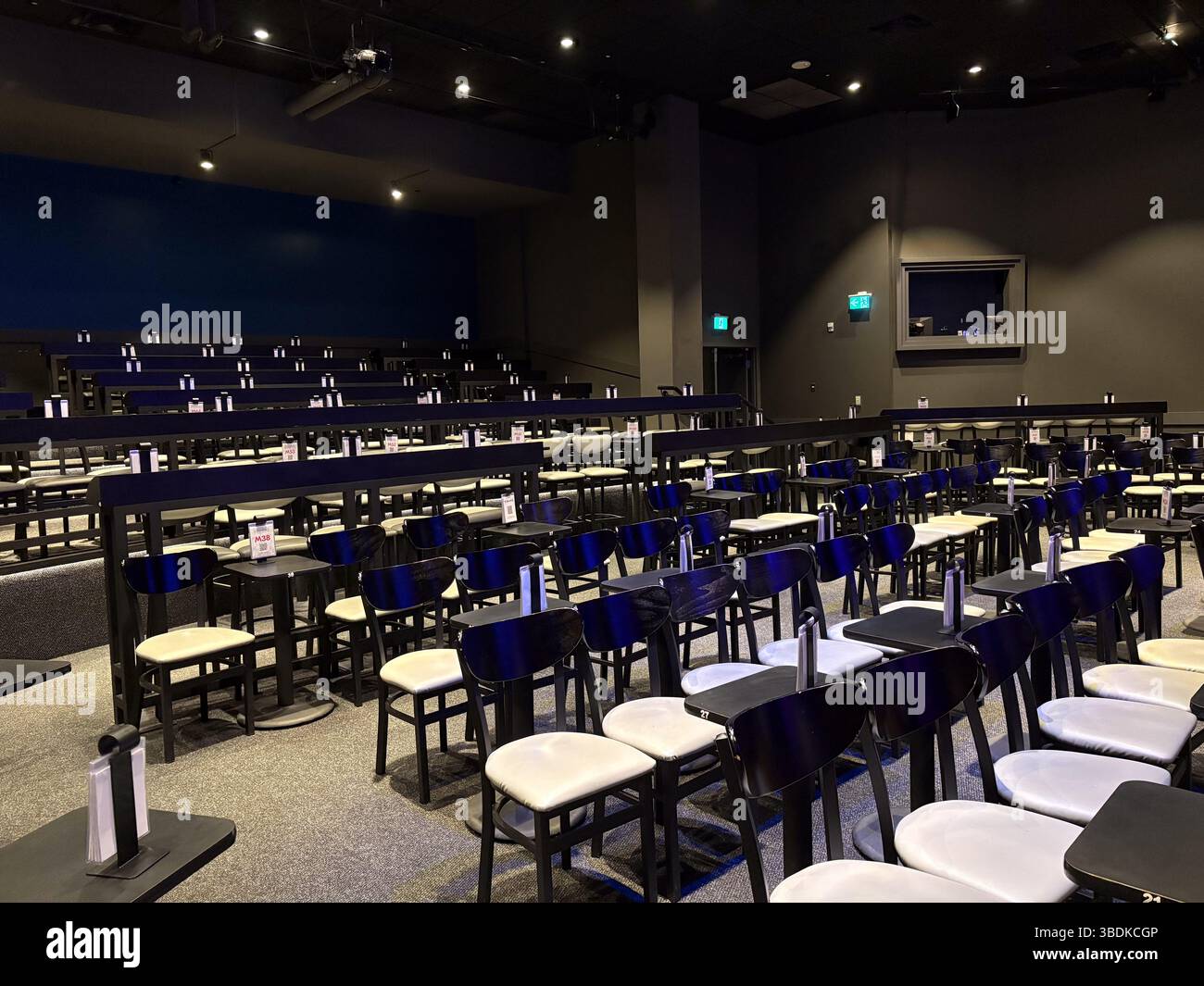 Second City Toronto theatre. Empty theatre seating area with tables and ...