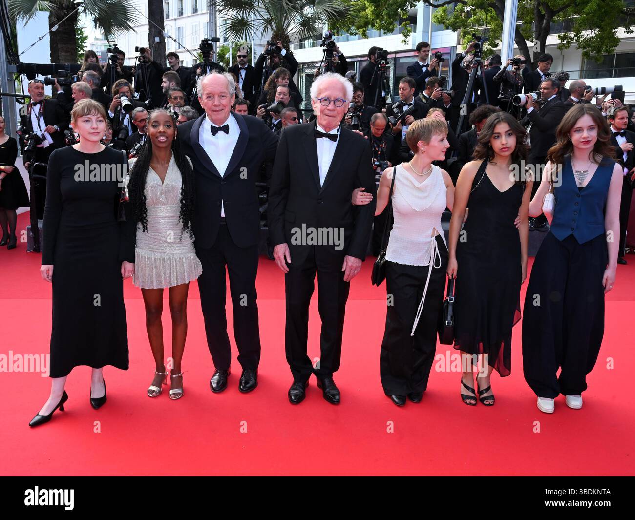 Cannes, France. 24th May, 2025. Final Night - Red Carpet Closing Ceremony Pictured: Elsa Houben, Lucie Laruelle, Luc Dardenne, Jean-Pierre Dardenne, Janaïna Halloy, Samia Hilmi, Babette Verbeek Credit: Independent Photo Agency/Alamy Live News Stock Photo