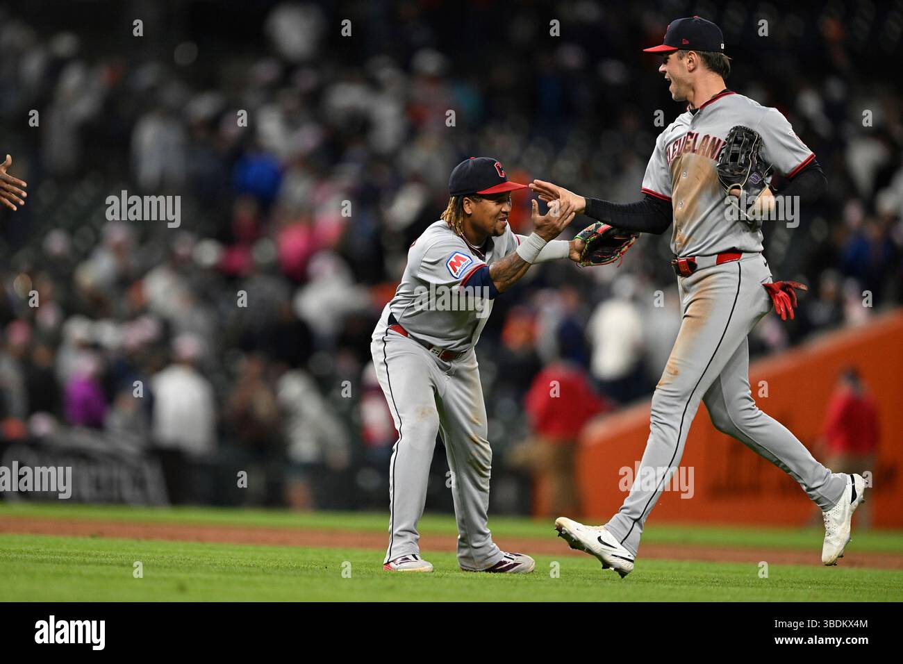 Cleveland Guardians third baseman José Ramírez, left, celebrates with ...