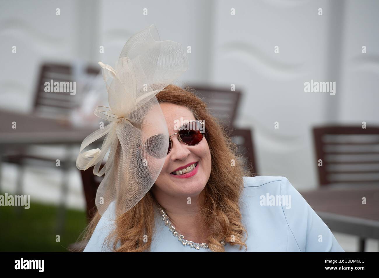 Windsor, Berkshire, UK. 24th May, 2025. It was a cooler evening in Windsor but the rain held off as racegoers enjoyed a busy  Royal Windsor's Summer Opening Party Racenight at Royal Windsor Racecourse in Windsor, Berkshire and the Live DJ set after racing with DJ Marvin Humes. Credit: Maureen McLean/Alamy Live News Stock Photo