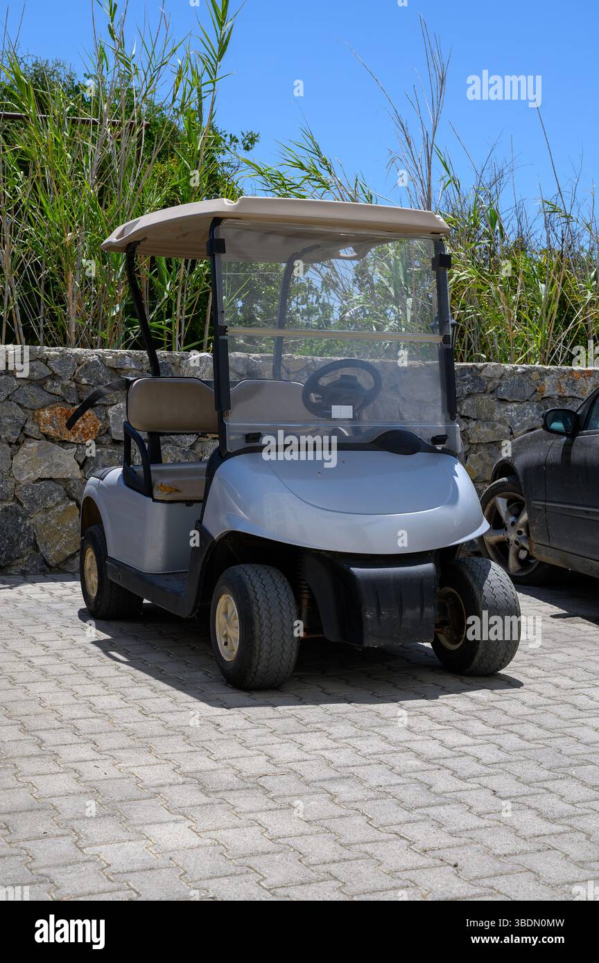 Golf buggy parked on hi-res stock photography and images - Alamy