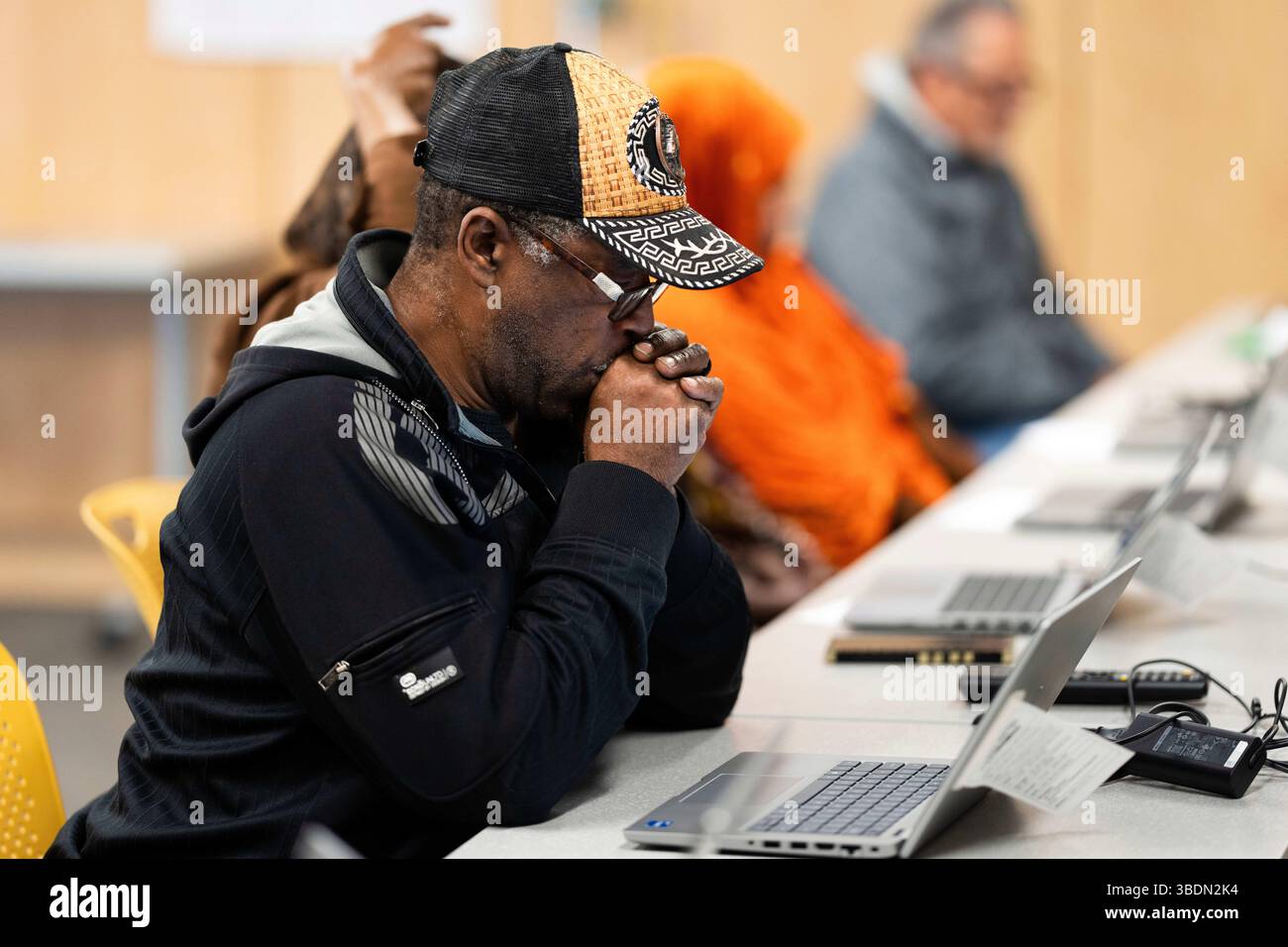 Brandon Dorn looks at his computer during a keyboard basics class ...