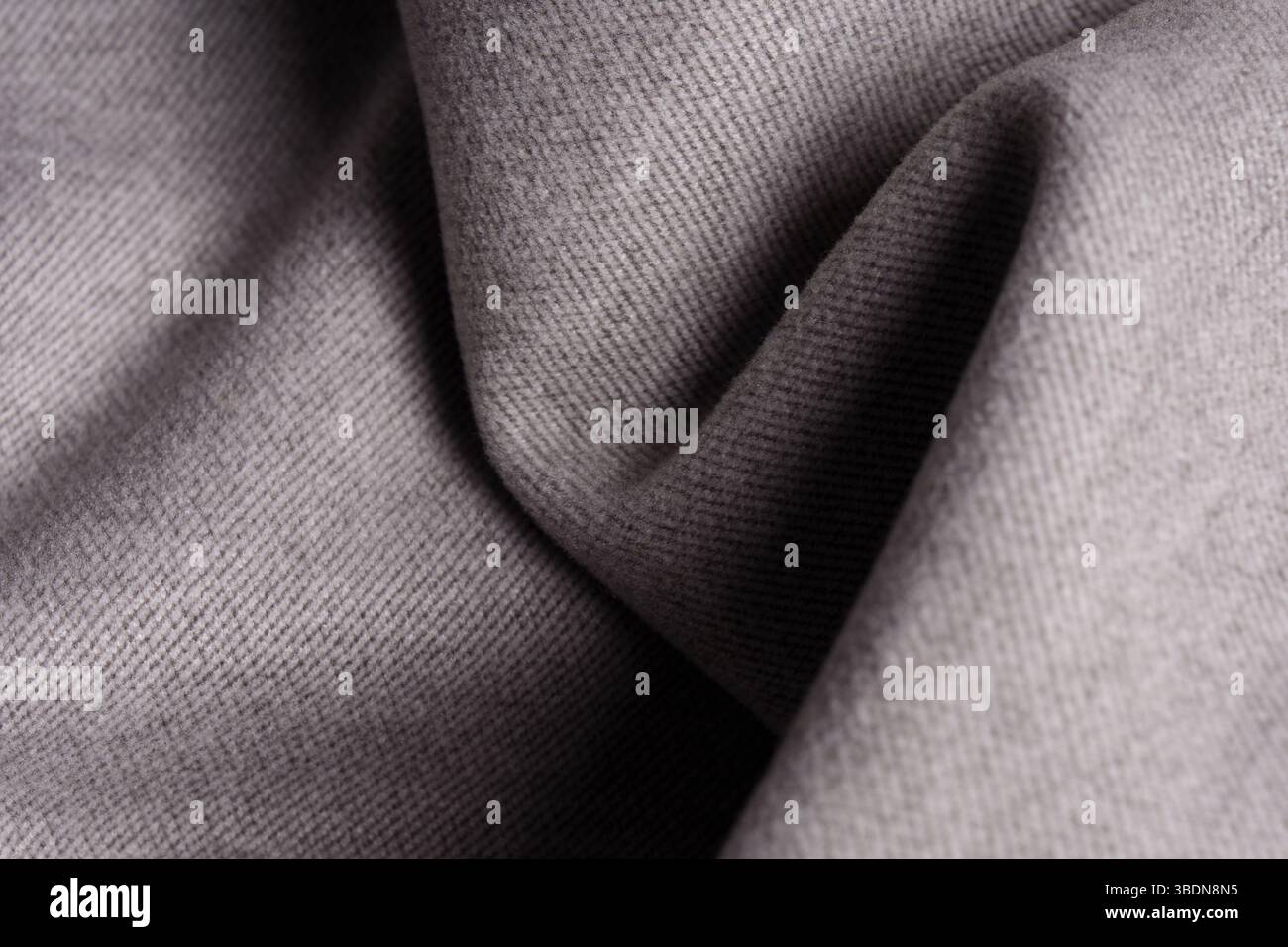Tweed fabric, wool, gray herringbone textile background. Textiles. Banner for advertising goods for creativity. Stock Photo
