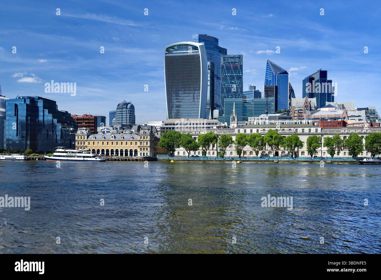 UK, London, The City of London Skyline and the River Thames from the Queen's Walk. Stock Photo