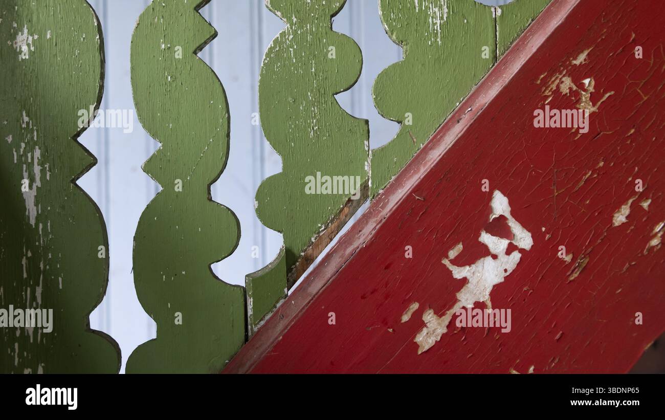 Old staircase detail painted red and green Stock Photo