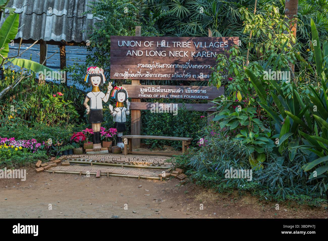 Sign near entrance of the Union of Hill Tribe Villages representing the Akha, Yao, Lahu, Kayaw, and Long neck Karen or Kayan people groups outside of Stock Photo