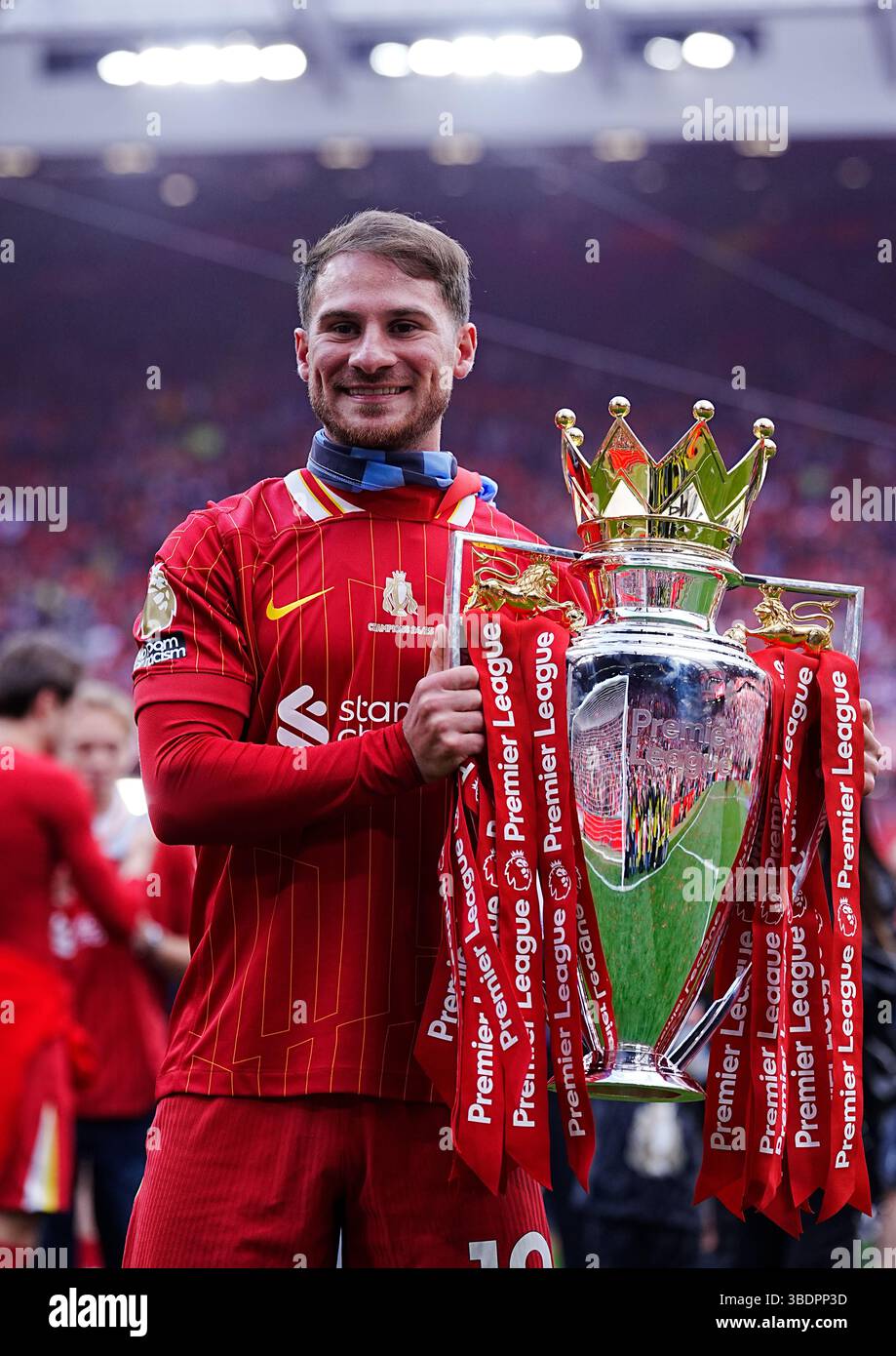 Liverpool's Alexis Mac Allister celebrates with the Premier League