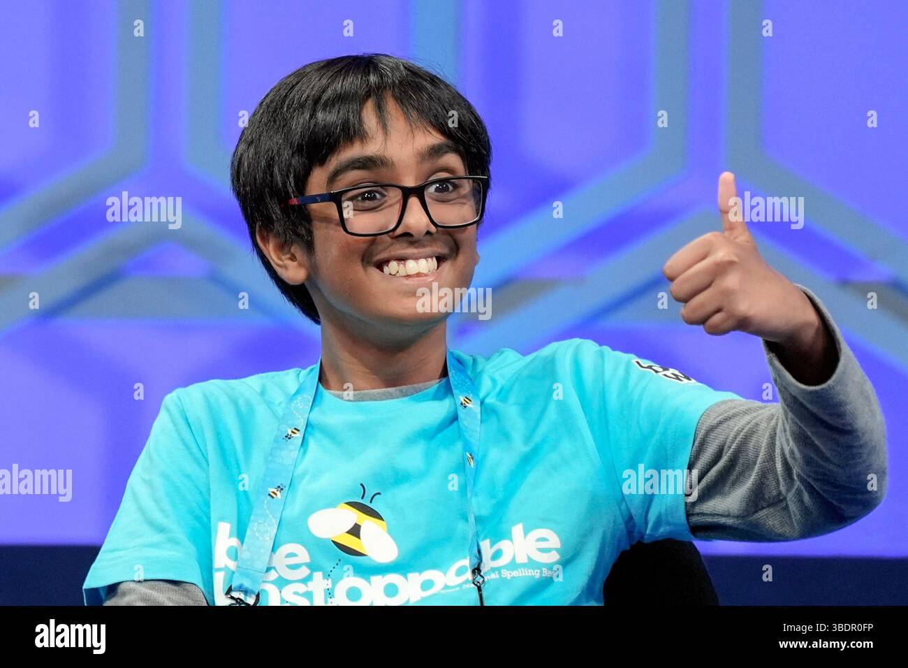 FILE - Faizan Zaki, 12, of Allen, Texas ., gestures to his family after ...